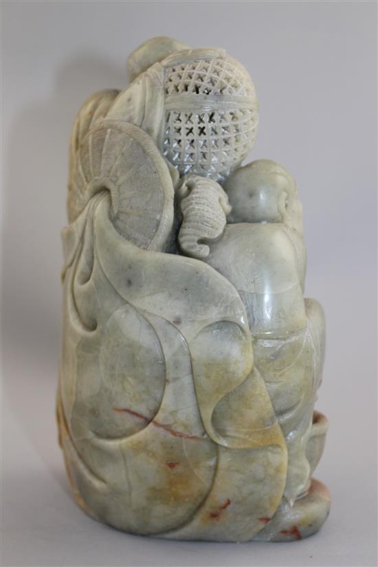 A Chinese soapstone group of three Luohan, 20th century, 22cm